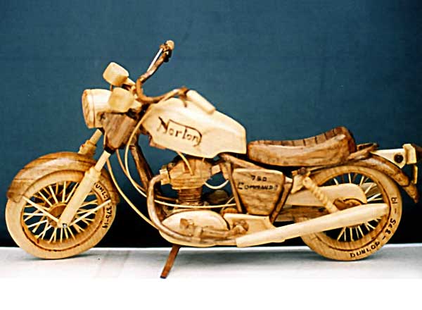 Carving of a Norton motorcycle